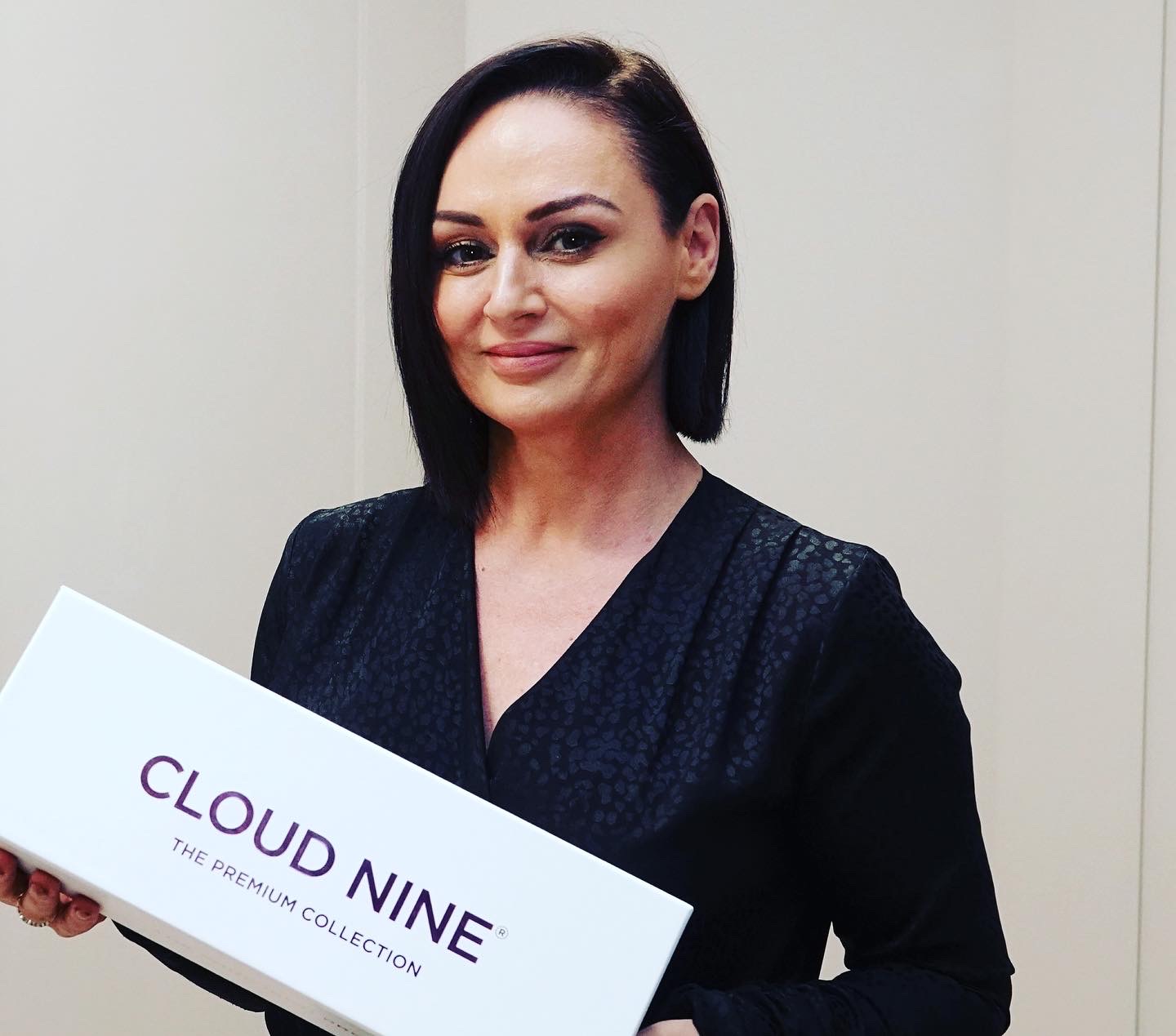 Seaneen holding the Cloud Nine Premium Collection box